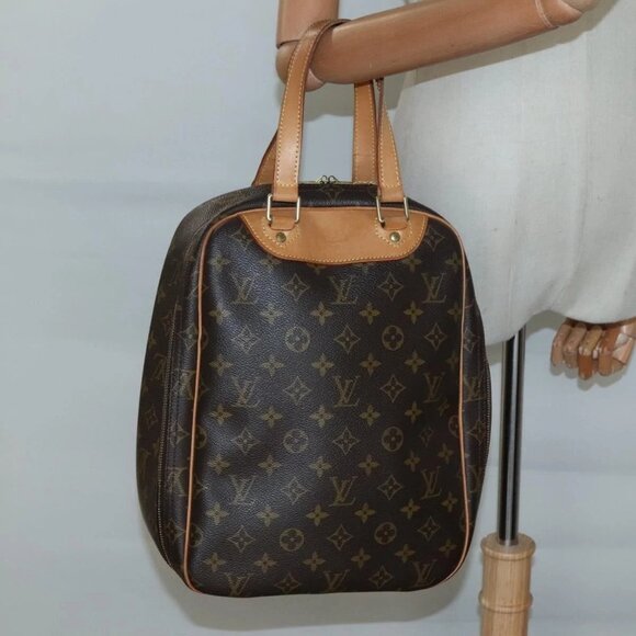 LOUIS VUITTON Monogram Excursion Hand Bag - Picture 1 of 16